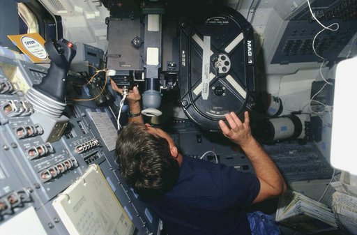 STS-29 Commander Coats in commanders seat on OV-103's forward flight deck
