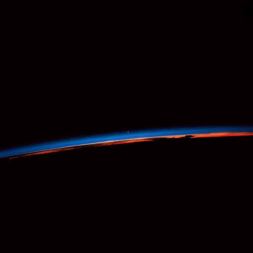 STS-30 sunset with Venus near the center of the frame