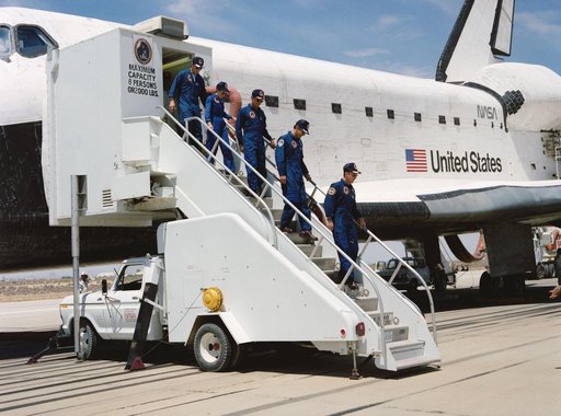 STS-30 crew egresses OV-104 via stairway at Edwards Air Force Base (EAFB)