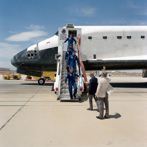 STS-30 crew egresses OV-104 via stairway at Edwards Air Force Base (EAFB)