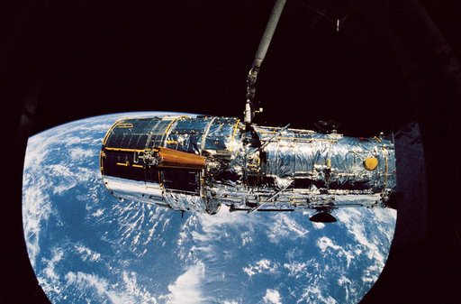 STS-31 Hubble Space Telescope (HST) solar array panel deploy aboard OV-103