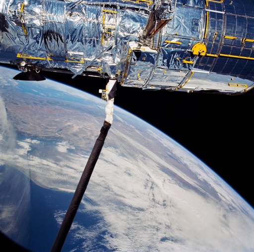 STS-31 Hubble Space Telescope (HST) solar array (SA) deploy aboard OV-103