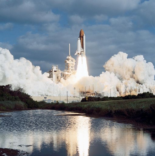 STS-31 Discovery, Orbiter Vehicle (OV) 103, lifts off from KSC LC Pad 39B