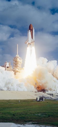 STS-31 Discovery, Orbiter Vehicle (OV) 103, lifts off from KSC LC Pad 39B