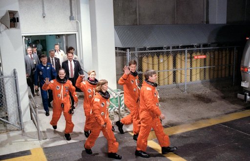 STS-32 crewmembers wave as they leave KSC O&C Bldg for launch pad