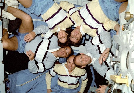 STS-33 crewmember pose on Discovery, OV-103, middeck for onboard portrait