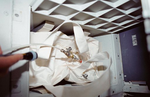 STS-35 stowage volume G with contingency water container (CWC) onboard OV-102