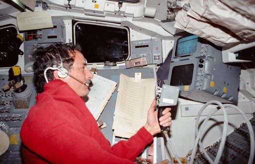 STS-35 MS Hoffman operates ASTRO-1 MPC on OV-102's aft flight deck