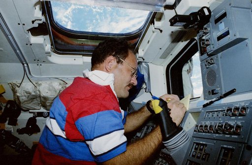 STS-35 MS Lounge records his observations on OV-102's aft flight deck