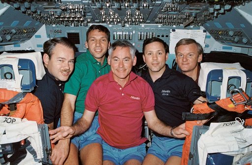 STS-36 crewmembers pose for group portrait on OV-104's forward flight deck