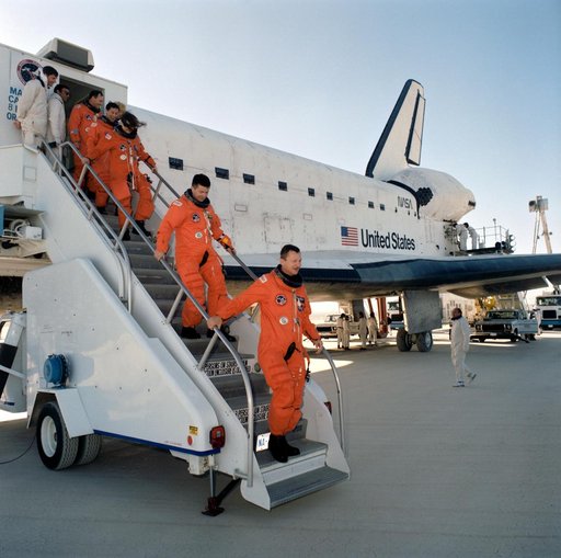 STS-37 crewmembers egress OV-104 via stairway after landing at EAFB