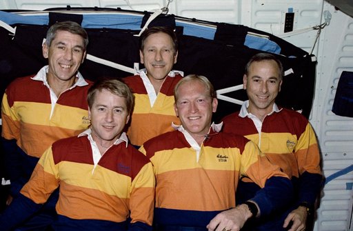 STS-38 crewmembers pose on OV-104's middeck for onboard crew portrait