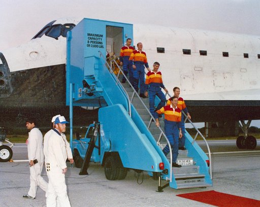 STS-38 crewmembers egress OV-104 via mobile stairway at KSC's SLF