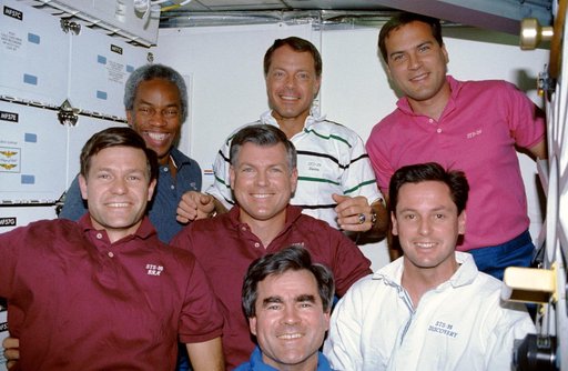 STS-39 crewmembers pose on OV-103's middeck for onboard portrait