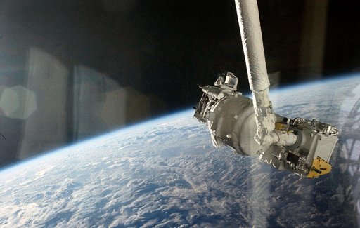 STS-39 SPAS-II IBSS is grappled by remote manipulator system (RMS)