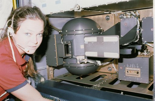 STS-40 Mission Specialist (MS) Jernigan monitors SLS-1 Rack 7 SSCE