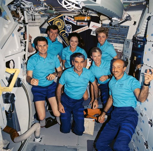 STS-40 crewmembers pose for onboard (in space) portrait on OV-102's middeck