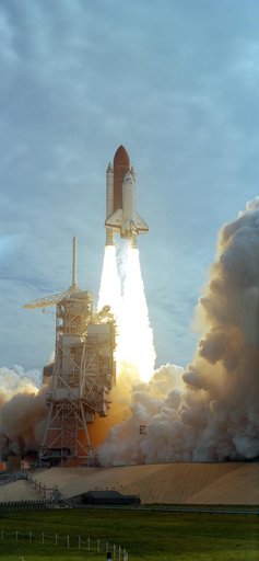 STS-40 Columbia, OV-102, lifts off from KSC with SLS-1 payload