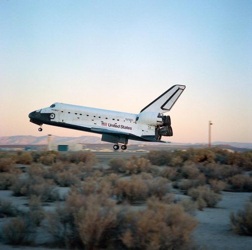 STS-41 Discovery, OV-103, glides over concrete runway 22 at EAFB, California
