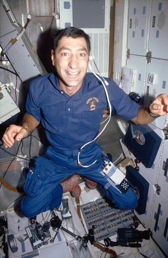 STS-44 Mission Specialist (MS) Runco floats on OV-104's middeck