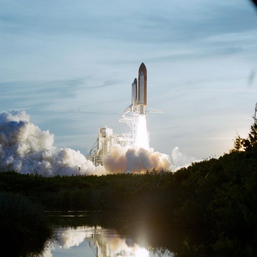 STS-48 Discovery, Orbiter Vehicle (OV) 103, lifts off from KSC LC Pad 39A