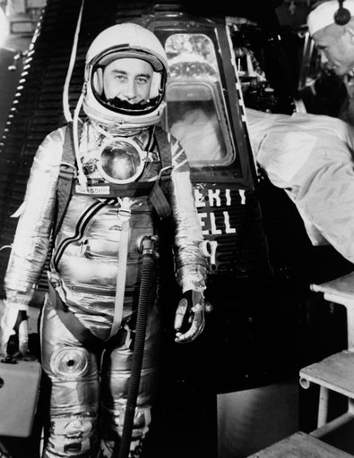 Astronaut Grissom on level 3 in front of Liberty Bell 7 capsule