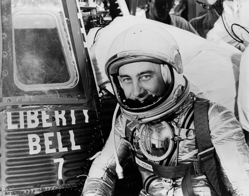 Astronaut Grissom on level 3 in front of Liberty Bell 7 capsule