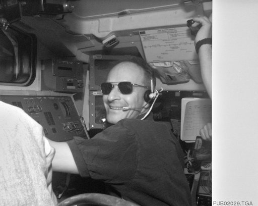 Electronic Still Camera image of Astronaut Claude Nicollier working with RMS