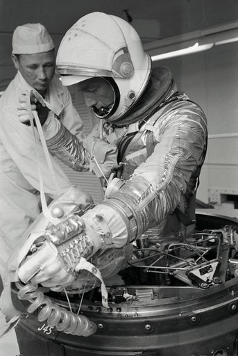 Astronaut Scott Carpenter completes top egress training in white room
