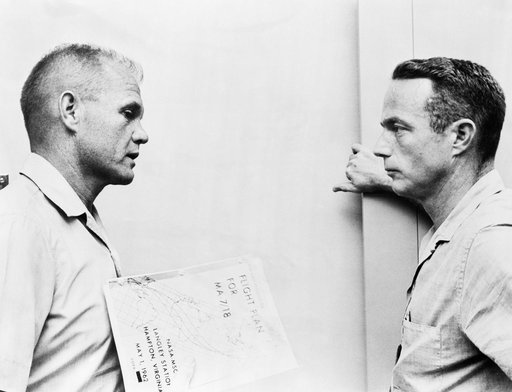 John Glenn and Scott Carpenter discuss flight plan for MA-7