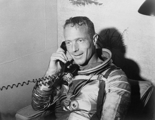 Scott Carpenter talking on the phone with President Kennedy