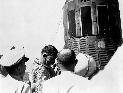 Astronaut Walter Schirra being removed from his Sigma 7 capsule
