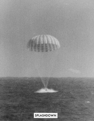 Landing of Mercury-Atlas 8 spacecraft with parachute extended