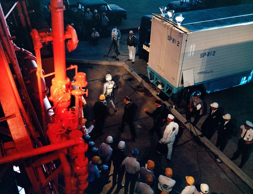 Astronaut Gordon Cooper leaves transfer van for launch pad