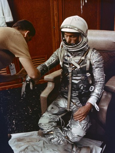 Astronaut Scott Carpenter in Hangar S crew quarters during suiting activity