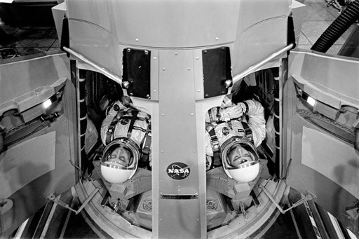 Astronauts Grissom and Young prepare to preform flight simulations