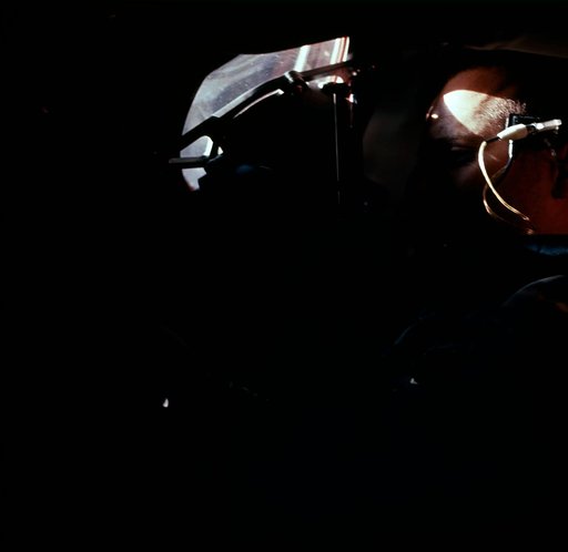 Astronaut Charles Conrad as seen through Gemini 5 spacecraft window
