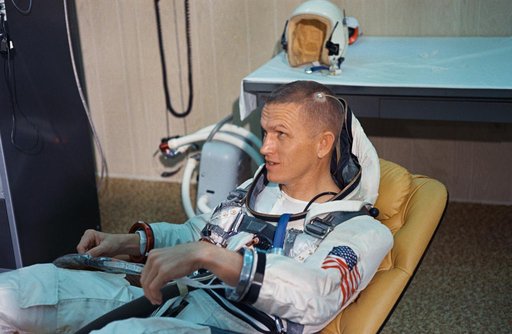 SUITING-UP (GEMINI-TITAN [GT]-7)(COMMAND PILOT W/O HELMET)(SENSORS ATTACHED) - CAPE