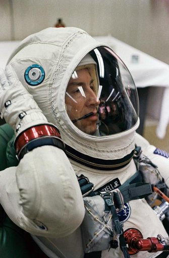 ASTRONAUT JAMES A. LOVELL, JR.  - SUIT - SUITING-UP (GEMINI-TITAN [GT]-7) - PILOT (HEAD SHOT W/HELMET) - LITEWEIGHT SUIT - CAPE