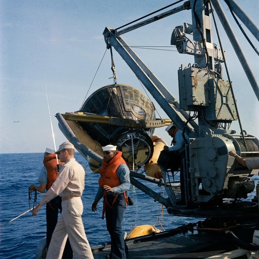 Gemini 8 spacecraft hoisted aboard the U.S.S. Leonard F. Mason