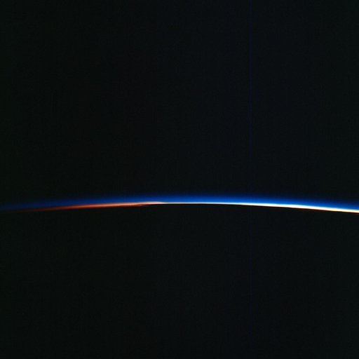 Earth's limb at sunrise as seen from the Gemini 9-A spacecraft