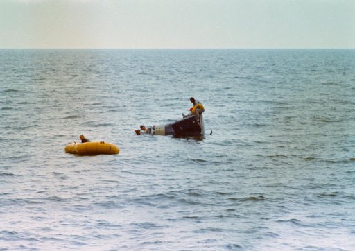 Astronauts Young and Collins during water egress training
