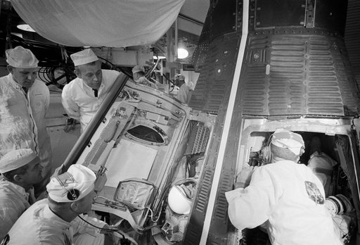 Technicians close hatches on Gemini 11 spacecraft during countdown