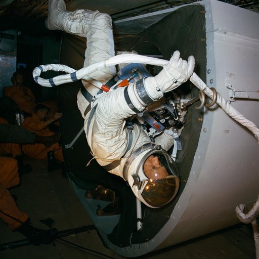 Astronaut Edwin Aldrin practices tether attachment aboard KC-135