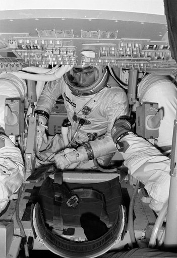 Astronaut John Young in Command Module Simulator during Apollo Simulation
