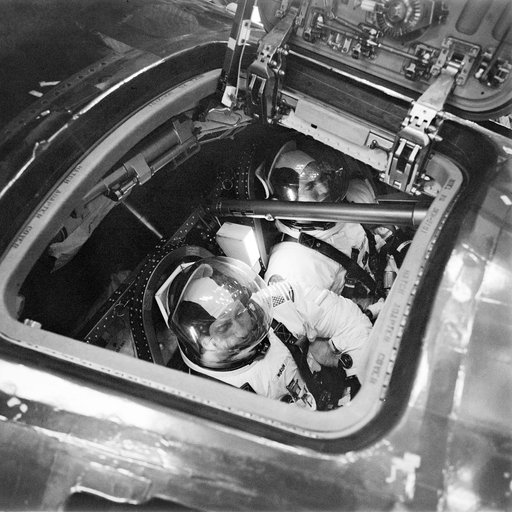 Apollo 15 crewmen inside Apollo 15 Command Module during simulation