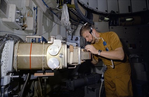 Astronaut Paul Weitz works with UV Stellar Astronomy Experiment