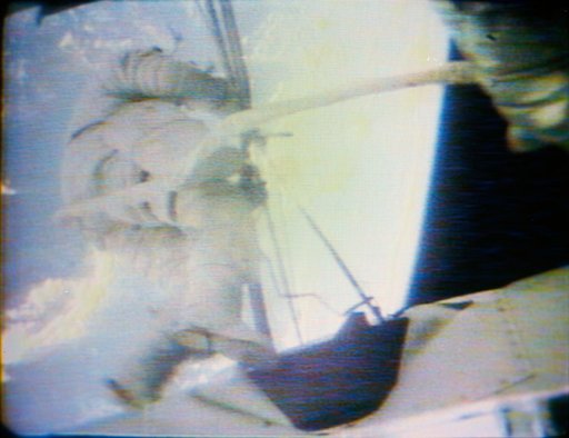 Skylab 2 Astronaut during EVA at Skylab 1 and 2 space station cluster