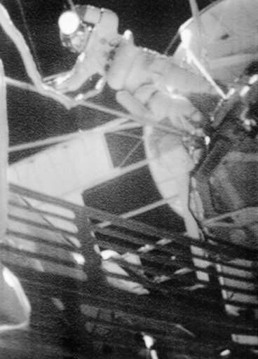 Astronaut Jack Lousma seen outside Skylab space station during EVA