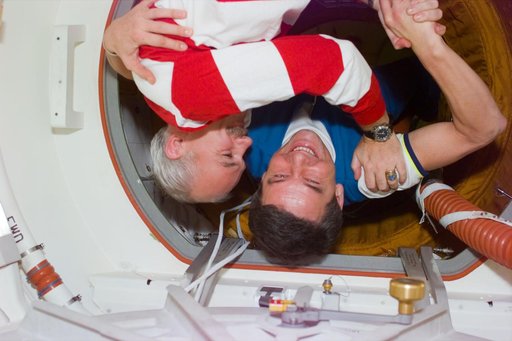 Greeting between STS-79 commander and Mir 22 commander after docking